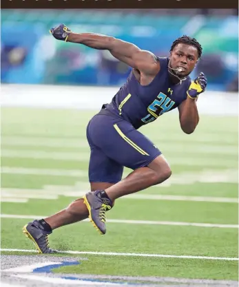  ?? BRIAN SPURLOCK, USA TODAY SPORTS ?? Jabrill Peppers worked out with linebacker­s and defensive backs at the NFL scouting combine.