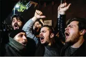  ?? CHRIS MCGRATH / GETTY IMAGES ?? Protesters in Istanbul, Turkey, shout slogans Wednesday outside the U.S. Consulate after President Trump’s decision on Jerusalem.