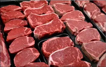  ?? AP Photo/J. Scott Aplewhite ?? In this 2010 file photo, steaks and other beef products are displayed for sale at a grocery store in McLean, Va.