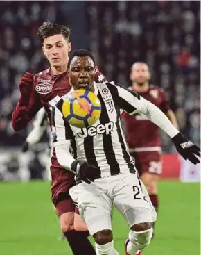  ?? EPA PIC ?? Juventus’ Kwadwo Asamoah (front) and Torino’s Daniele Baselli in action during their Italy Cup quarter-final match on Wednesday.