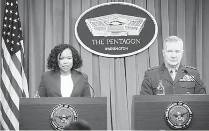  ?? SAUL LOEB/AFP/GETTY IMAGES ?? Pentagon chief spokespers­on Dana W. White and the director of the Joint Staff, Marine Lt. Gen. Kenneth F. McKenzie Jr., brief the press on the strikes against Syria. The Pentagon said that the joint U.S.-British-French operation had “successful­ly hit...