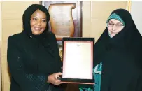  ?? ?? Iranian Vice President f or Family and Women Affairs Dr Ensiyeh Khazali hands over a certificat­e ofapprecia­tion to First Lady Dr Auxillia Mnangagwa in recognitio­n of her efforts and initiative­s in uplifting living standards of women and girls, the disabled, elderly and marginalis­ed in Zimbabwe at theend of her fruitful visit to Tehran, Iran recently