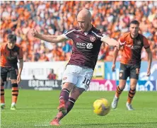  ??  ?? Top: Hearts’ Armand Gnanduille­t finds the net to make it 2-0. Above: Liam Boyce’s penalty was saved but he netted the rebound.