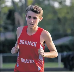  ?? GARY MIDDENDORF / DAILY SOUTHTOWN ?? Bremen’s Zach Casper heads toward the finish line in first place during a dual meet against Oak Forest.