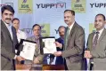  ??  ?? BSNL CMD PK Purwar (right) with YuppTV Founder & CEO Uday Reddy