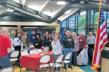  ?? EVERGREEN PARK CHS PHOTO ?? Students and veterans say the Pledge of Allegiance during a veterans breakfast Thursday at Evergreen Park Community High School.