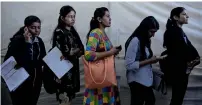  ?? Reuters file ?? AT A JOB FAIR...BUT IS IT FAIR?: Mllions of educated unemployed have to go for months and years without a job. —