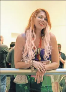  ??  ?? Jax Madden of Taylorsvil­le, a software company product manager, has been coming to Dragon Con for about a decade and has been costuming for about 15 years. Her favorite outfit is her mermaid and enjoys being recognized by children when she does an Ariel version of it.