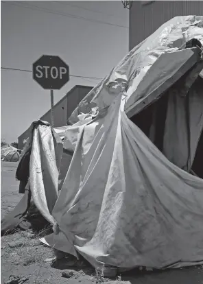  ??  ?? Samantha, 22, who is eight months pregnant and has been homeless for five years, is living in an encampment in Berkeley.