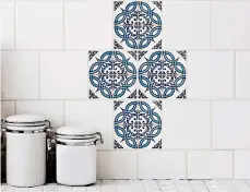  ?? STICKPRETT­Y ?? StickPrett­y’s Azul Mosaic tile decals can transform any tiled space into an artful eyeful of color and pattern.