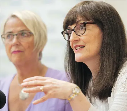  ?? JASON PAYNE/PNG ?? Patricia Daly, chief medical officer at Vancouver Coastal Health Authority, right, makes a point Thursday while provincial Mental Health and Addictions Minister Judy Darcy looks on.