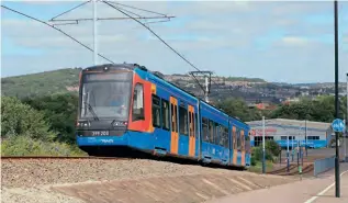  ?? ALEX NOBLE/CC0 1.0 ?? Sheffield Supertram Class 399 Citylink No. 399203 climbs away from the Woodbourn Road stop with a Cathedral-bound service on July 29, 2020.