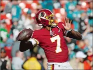  ?? PATRICK SEMANSKY/AP FILE PHOTO ?? In this Dec. 15, 2019, file photo, Washington Redskins quarterbac­k Dwayne Haskins warms up before a game in Landover, Md. The Washington NFL franchise announced Monday that it will drop the “Redskins” name and Indian head logo immediatel­y, bowing to decades of criticism that they are offensive to Native Americans.