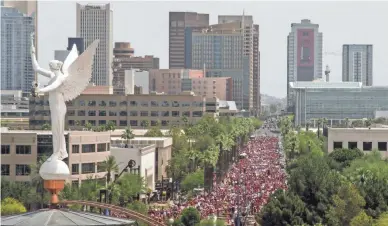  ??  ?? If the state board moves to punish #RedForEd teachers, those teachers will flex their muscles once more. And they will have the public’s support. Do those board members really want the red sea flooding their board room?