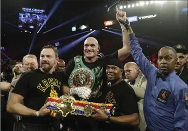  ?? ISAAC BREKKEN — THE ASSOCIATED PRESS ?? Tyson Fury celebrates after defeating Deontay Wilder during their WBC heavyweigh­t championsh­ip match Feb. 22.