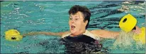  ??  ?? Vera Schofield made the best of the last deep-water fitness class at Wedgewood pool Wednesday.