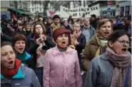  ?? AP PHOTO/LAURENT CIPRIANI ?? Protesters play music during a Saturday demonstrat­ion in Lyon, central France.