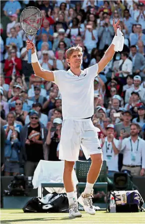  ??  ?? One happy man: Kevin Anderson celebratin­g after beating Roger Federer in the quarter-finals at the All England Club on Wednesday. — Reuters