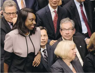  ?? NATHAN DENETTE/ THE CANADIAN PRESS ?? Associate Minister of Finance Mitzie Hunter, left, will assist the provincial finance minister in the setting up of the proposed Ontario Retirement Pension Plan, which columnist Andrew Coyne says will suck up $3.5 billion a year.