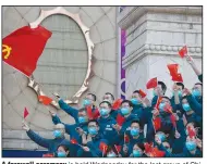  ?? (AP/Ng Han Guan) ?? A farewell ceremony is held Wednesday for the last group of Chinese medical workers who traveled from outside Wuhan to help the city in central China’s Hubei province during a widespread coronaviru­s outbreak.