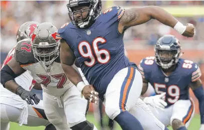  ?? GETTY IMAGES ?? Bears defensive end Akiem Hicks, who was ejected Sunday against the Buccaneers, has three sacks after four games.
