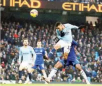  ?? Associated Press ?? Manchester City’s Gabriel Jesus scores a goal against Everton during their EPL match on Saturday.