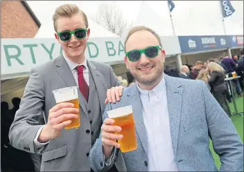  ?? Pictures: FLYNET-SPLASHNEWS, DAVID SIMS/WENN, FARRELL/BACKGRID ?? Punters raised a glass on the first day of the Grand National meeting on Merseyside yesterday