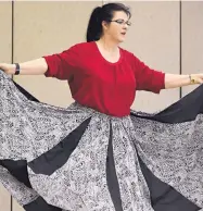  ?? DEAN HANSON/JOURNAL ?? Emily Blea prepares for a performanc­e during the New Mexican Folk Dance class at Manzano Mesa Multi-Generation­al Center.