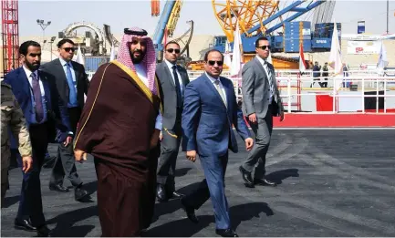  ??  ?? Saudi Crown Prince Mohammed bin Salman and Egyptian President Abdel Fattah El-Sisi visiting the Suez Canal in the city of Ismailia, east of Cairo, on Monday. (AFP)