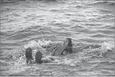  ?? JIM DAY/THE GUARDIAN ?? Donnie Morris, acting search and rescue preparedne­ss officer with the Canadian Coast Guard, played the role of casualty in a search and rescue exercise Wednesday that involved about 120 people joining forces.