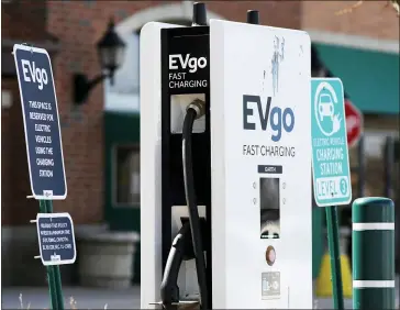  ?? NAM Y. HUH — THE ASSOCIATED PRESS ?? A EVgo electric vehicle charging station in Northbrook, Ill. President Joe Biden’s $2trillion infrastruc­ture plan includes a proposal to build a national network of 500,000electri­c vehicle chargers by 2030and replace 50,000diesel public transit vehicles.