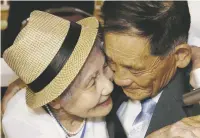  ?? LEE JI-EUN/YONHAP VIA AP ?? South Korean Lee Keum-seom, 92, left, hugs her North Korean son, Ri Sang Chol, 71, during the Separated Family Reunion Meeting at the Diamond Mountain resort Monday in North Korea.