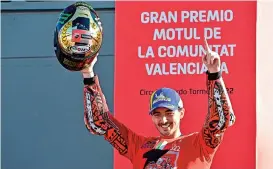  ?? (AFP) ?? Ducati’skfrancesc­okbagnaiak­celebrates­kafterkwin­ningkthekw­orldkchamp­ionshiprsk­titlekinkv­alenciakon­ksundayk