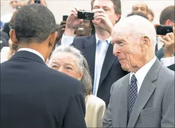  ??  ?? Former President Barack Obama greets Elsie and Henry Hillman after a speech at Carnegie Mellon University in Oakland in June 2010.