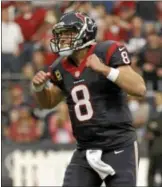  ?? AP Photo ?? Texans quarterbac­k Matt Schaub reacts to throwing an intercepti­on to the Bengals’ Leon Hall during the second quarter Saturday in Houston.