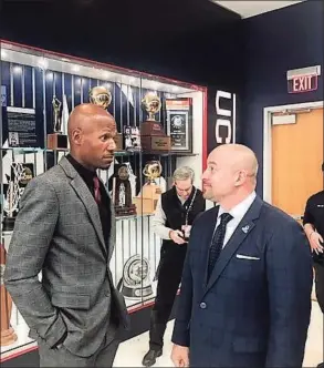  ?? David Borges / New Haven Register ?? Ray Allen talks with UConn athletic director David Benedict prior to a ribbon-cutting ceremony for UConn's Hall of Champions on Saturday.