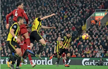  ?? AP ?? Liverpool’s Virgil van Dijk (top left) scores a goal against Watford during the Premier League match. —