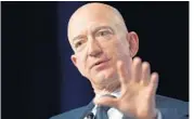  ?? JIM WATSON/GETTY-AFP ?? The internet age has put increased risk on the super wealthy, including Amazon.com founder Jeff Bezos.