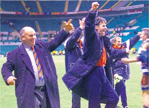  ??  ?? JUBILATION: Joy unbounded as Caley Thistle celebrate their famous Scottish Cup victory over Celtic at Parkhead in February 2000