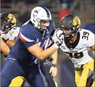  ?? Icon Sportswire / via Getty Images ?? Missouri defensive lineman Chris Turner (39) and UConn offensive lineman Ryan Van Demark (74) in action during a game in 2017.