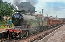  ?? ?? Making its final gala appearance ahead of overhaul, LNER ‘B12’ 4-6-0 No. 8572 is seen at Sheringham on September 3 with the LNER Quad Art carriage set. NNR