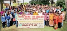  ??  ?? Selmo Managing Director, Anton Hemantha with his staff posing for a photograph at the 30th anniversar­y celebratio­ns