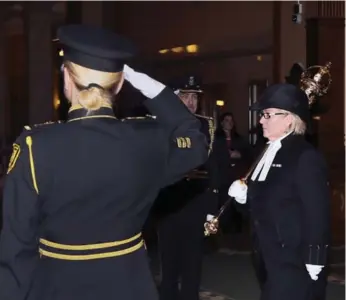  ?? ANDREW FRANCIS WALLACE/TORONTO STAR ?? Ontario’s new sergeant-at-arms, Jackie Gordon, leads her first procession into the legislatur­e on Tuesday.