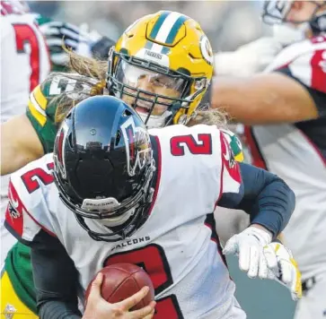  ?? AP PHOTO/JEFFREY PHELPS ?? The Green Bay Packers’ Clay Matthews sacks the Atlanta Falcons’ Matt Ryan during the second half Sunday in Green Bay, Wis. The Packers beat the Falcons