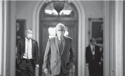  ?? AL DRAGO/THE NEW YORK TIMES ?? Senate Majority Leader Mitch McConnell, R-Ky., walks to his office from the Senate floor of the Capitol on Thursday.