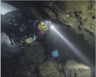  ?? Images from National Geographic ?? CAVE DIVERS heeded the call when 12 young soccer players and their coach were trapped by flooding.