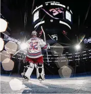  ?? Harry How/Getty Images ?? Rangers goalie Jonathan Quick acknowledg­es applause from the crowd after a stop in play to recognize his accomplish­ments as a member of the Kings during the first period on Saturday in Los Angeles.