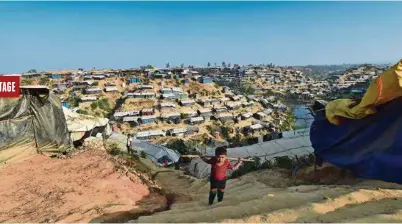  ?? (MUNIR UZ ZAMAN/AFP PHOTO) ?? Les cahutes des réfugiés sont à la merci de glissement­s de terrain ou d’inondation­s durant la mousson.