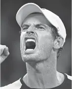  ?? SAEED KHAN/AFP/GETTY IMAGES ?? Britain’s Andy Murray reacts after a point during his match against Spain’s Roberto Bautista Agut on the opening day of the Australian Open.