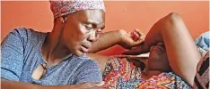  ?? PHANDO JIKELO African News Agency (ANA) ?? ASANDA’S mother, Buyiswa Manono (right), in tears after the news of her son’s death. He was killed by members of his family and of the community in the Eastern Cape after being accused of stealing and selling a relative’s clothes. With her is her sister Boniwe Manono. |